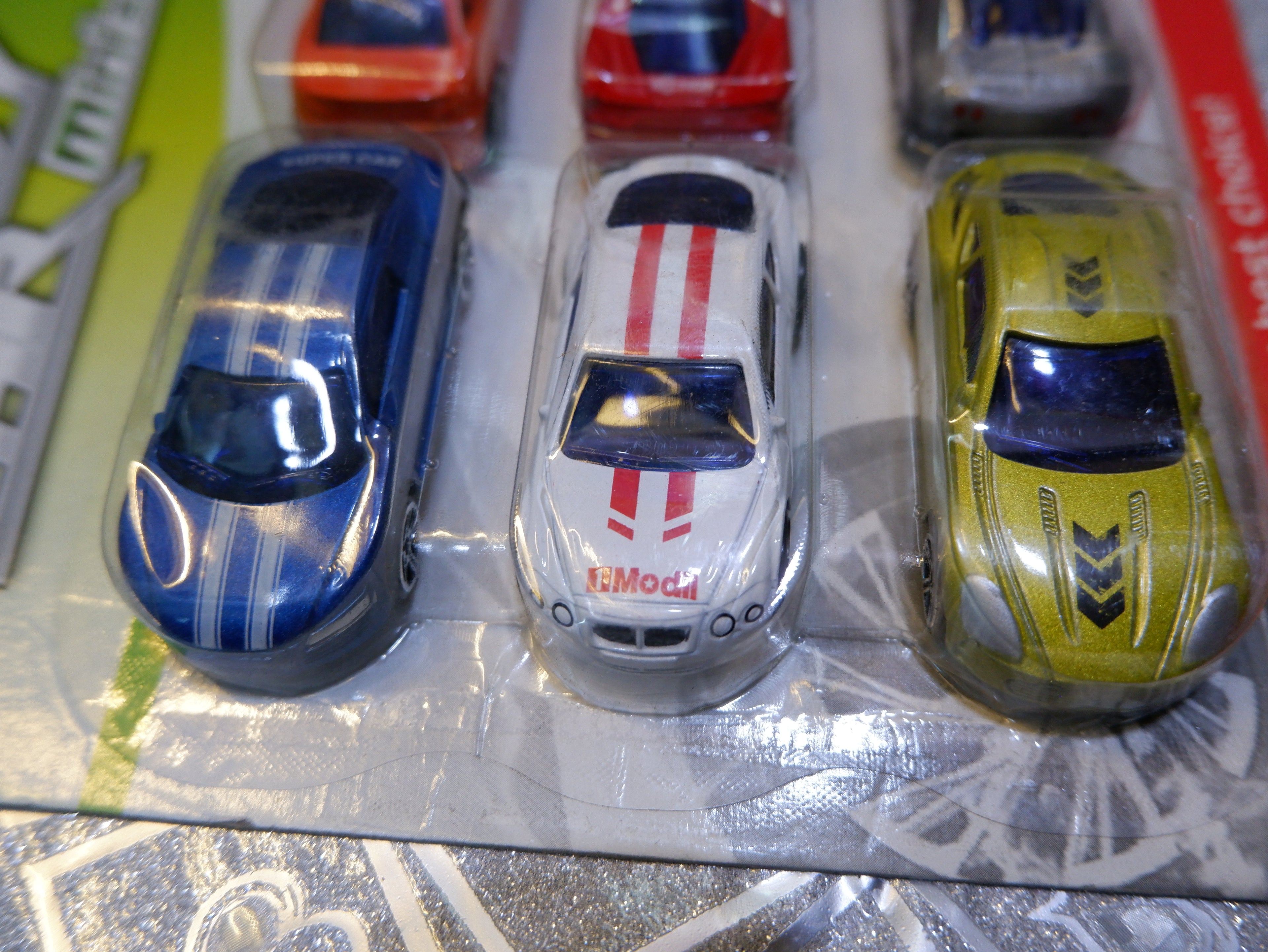 set of six die-cast alloy toy cars in a mini series package